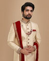 alt message - Manyavar Men Beige Sherwani Suit With Bold Zardozi Work image number 0