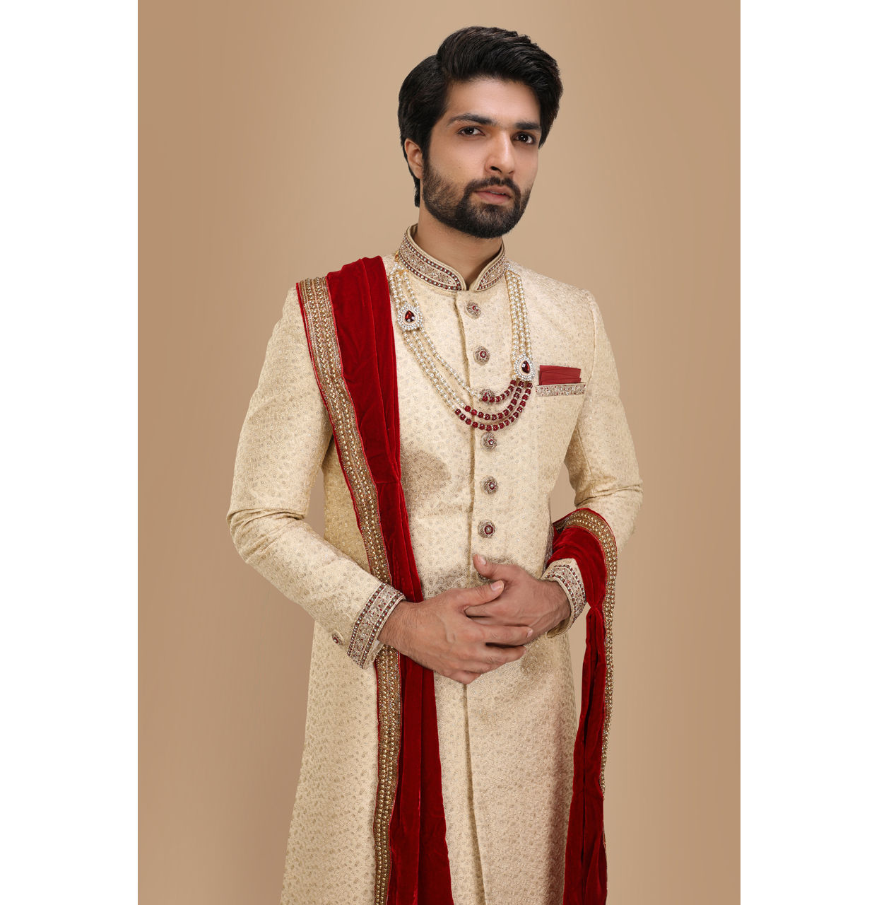 alt message - Manyavar Men Beige Sherwani Suit With Bold Zardozi Work image number 0