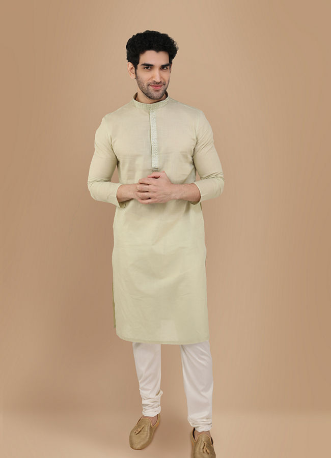 alt message - Manyavar Men Light Green Solid Kurta Set With Neck Detailing image number 0