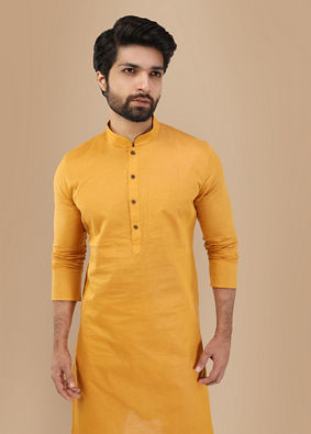 alt message - Manyavar Men Mustard Yellow Solid Kurta image number 0