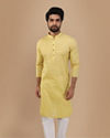 alt message - Manyavar Men Faded Yellow Solid Kurta image number 1