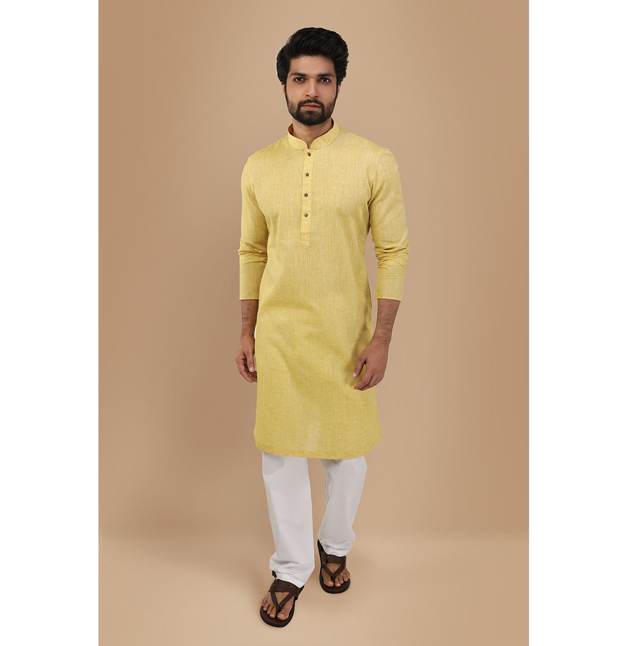 alt message - Manyavar Men Faded Yellow Solid Kurta image number 1