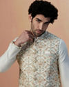 alt message - Manyavar Men Light Cream Self Design Kurta Jacket Set image number 0