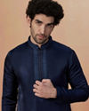 alt message - Manyavar Men Navy Blue Self Booti Kurta Pajama image number 0