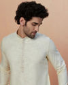 alt message - Manyavar Men Light Cream Plain Kurta Pajama image number 0