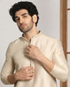 alt message - Manyavar Men Off White Festive Kurta With Printed Motifs image number 0