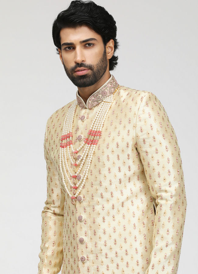 alt message - Manyavar Men Beige Sherwani With Contrasting Motifs image number 0