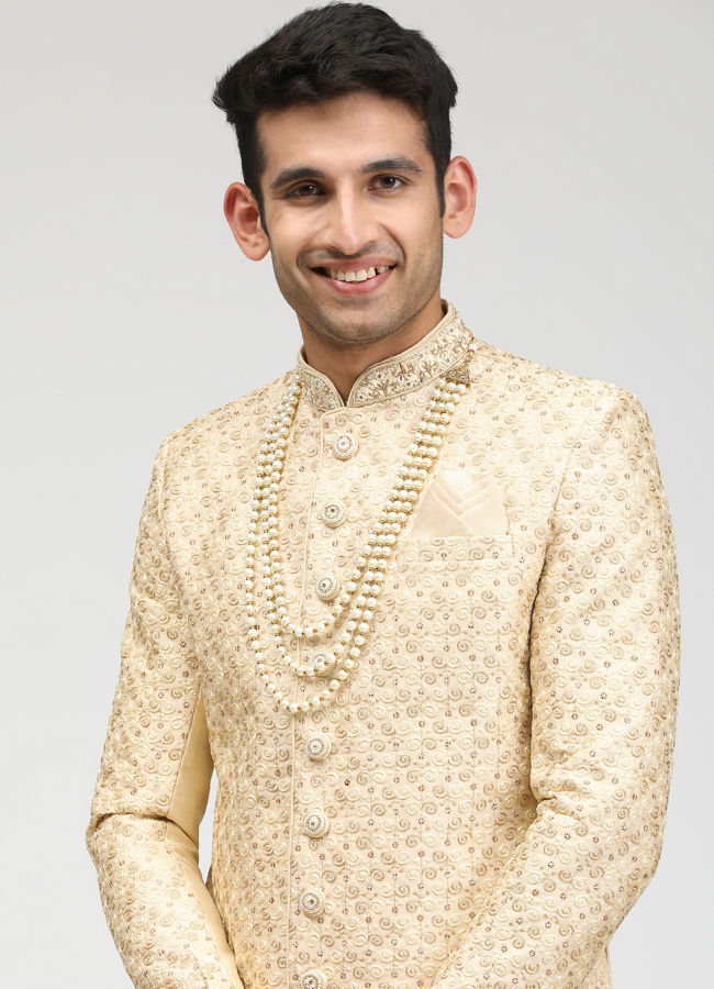 alt message - Manyavar Men Minimalist Cream Sherwani image number 0