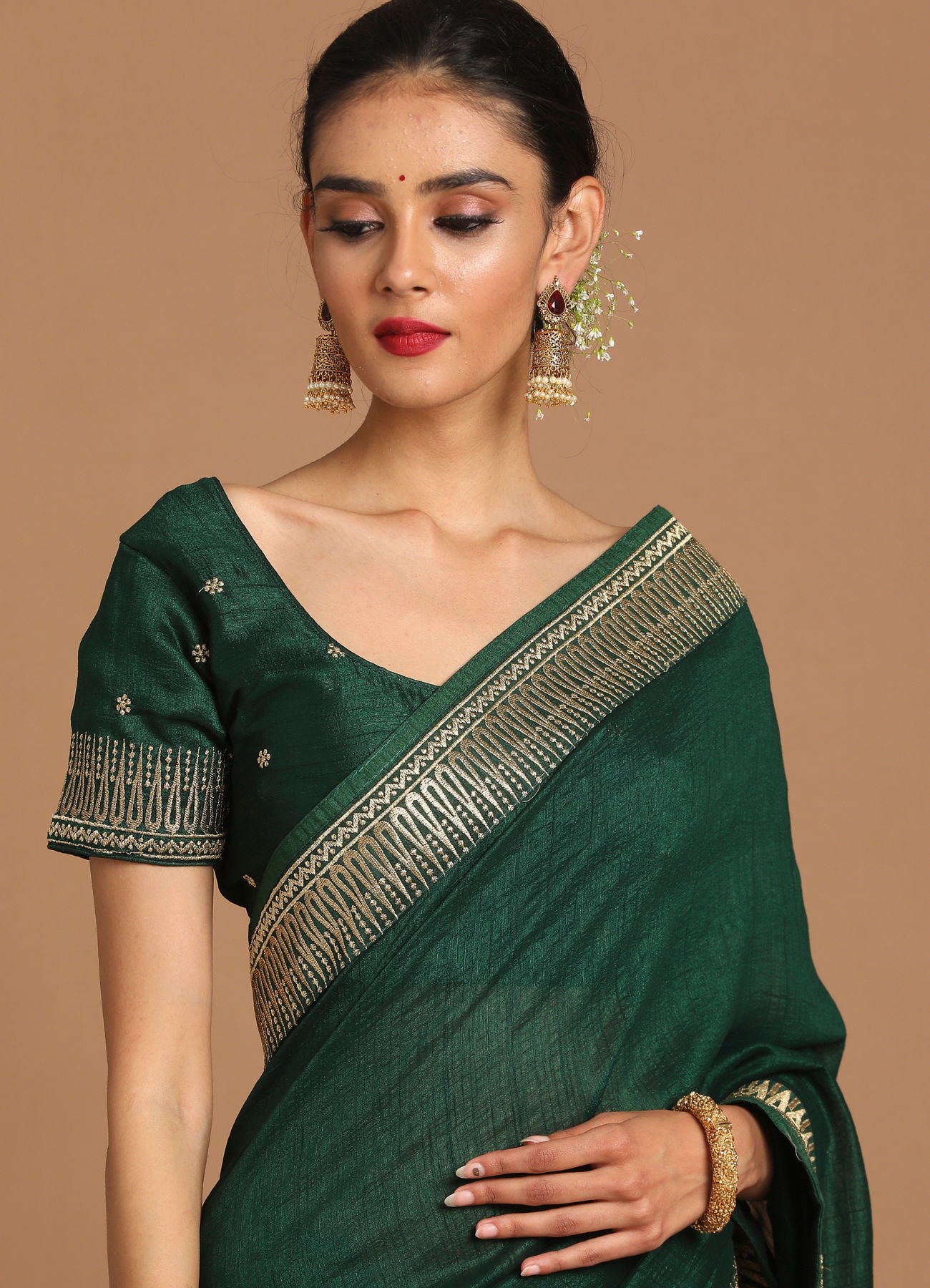 Mohey Women Bodacious Bottle Green Saree