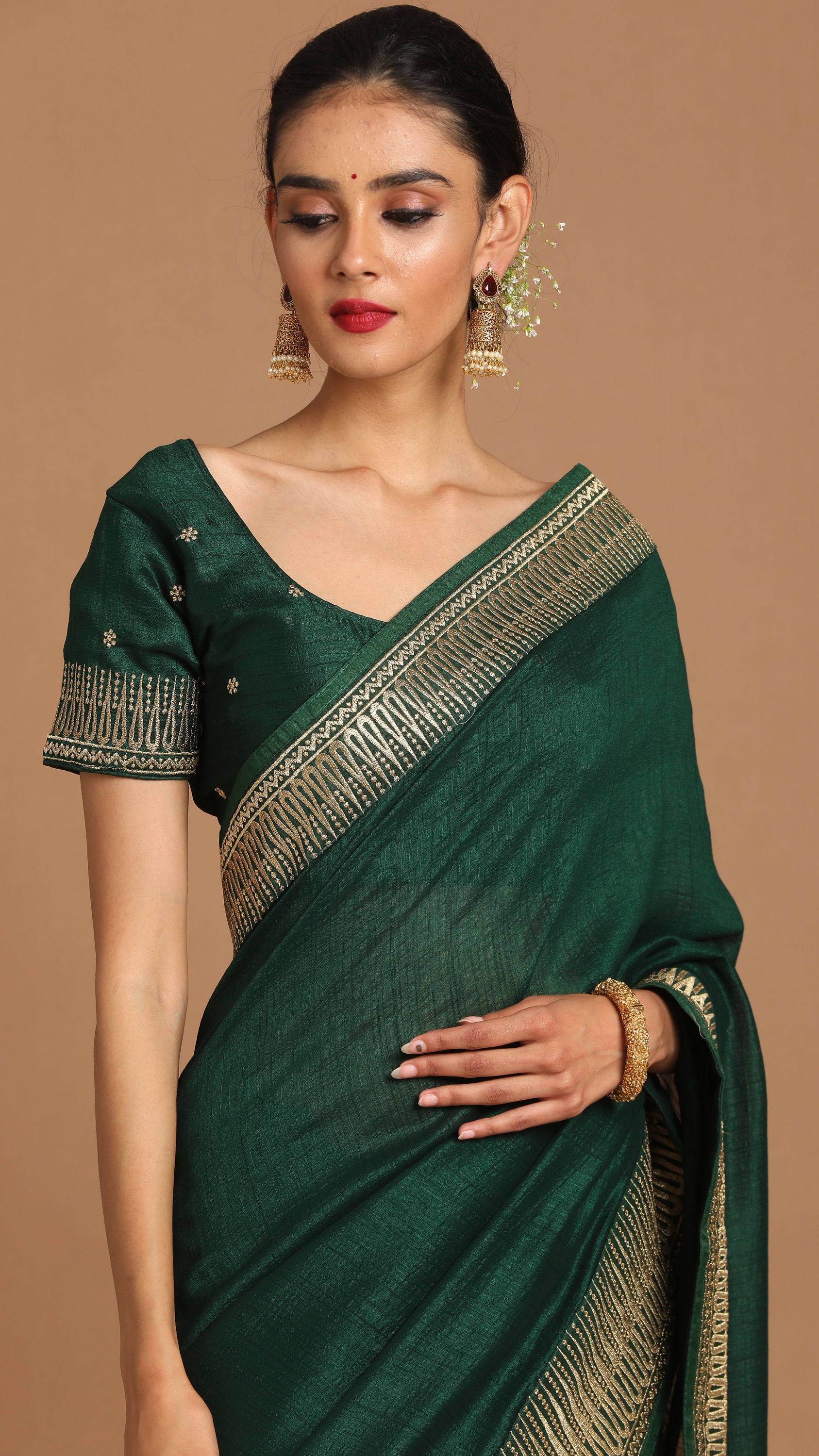 Mohey Women Bodacious Bottle Green Saree