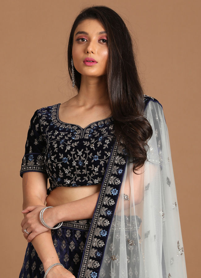 alt message - Mohey Women Indigo Blue Velvet Lehenga image number 1