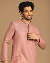 alt message - Manyavar Men Classy Pink Kurta Set image number 0