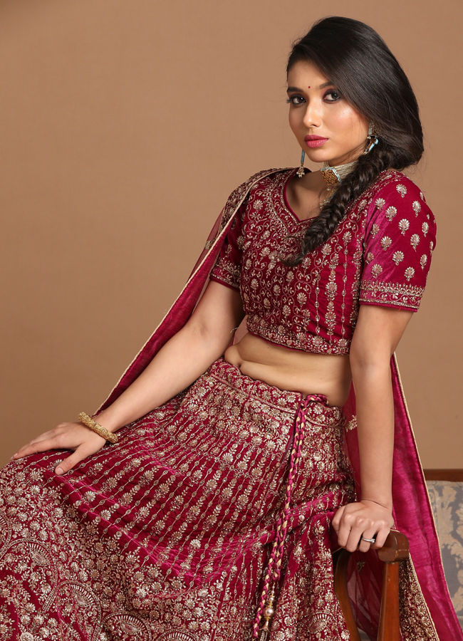 alt message - Mohey Women Velvet Wine Red Lehenga image number 0