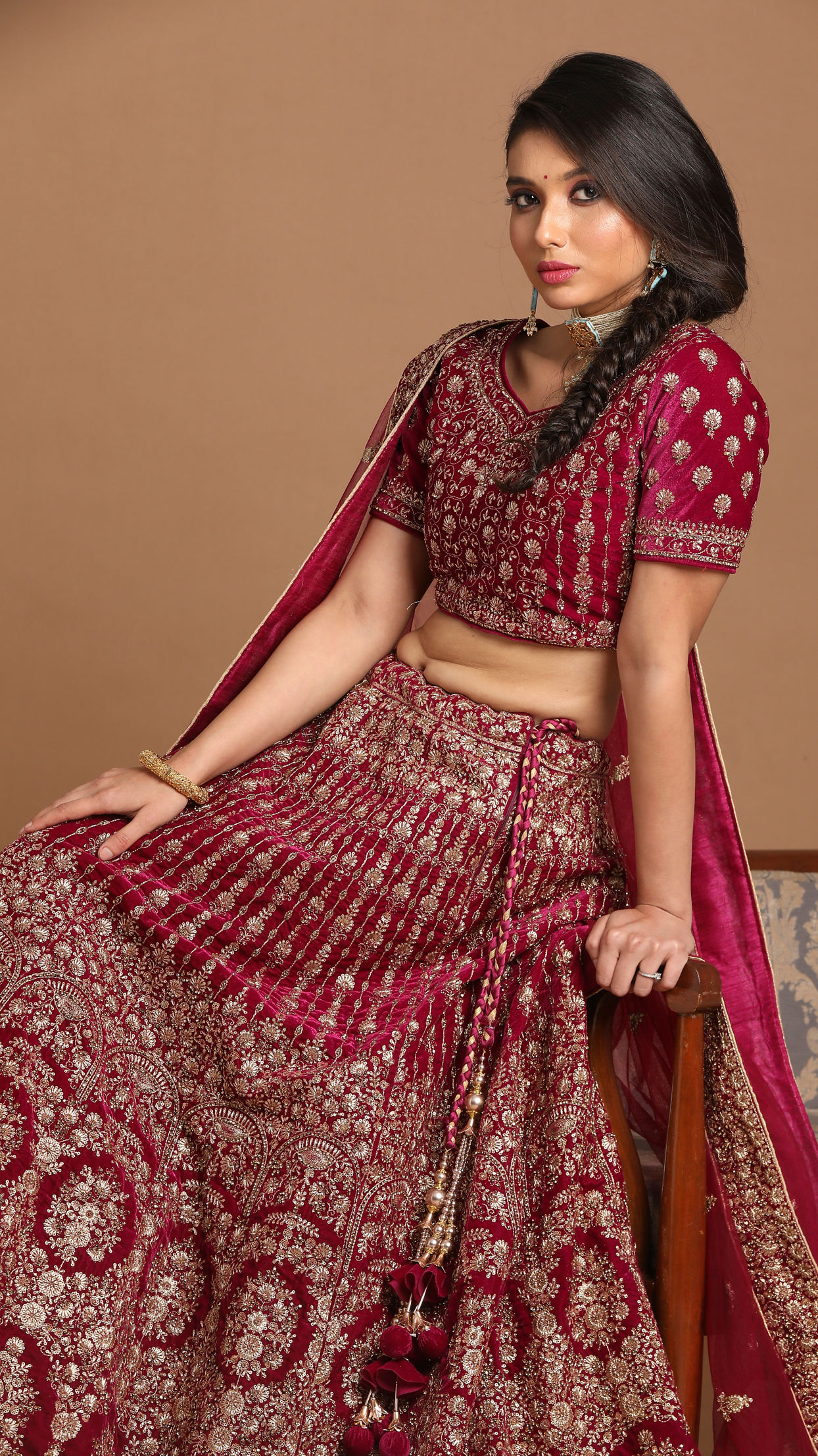 alt message - Mohey Women Velvet Wine Red Lehenga image number 0