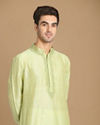 alt message - Manyavar Men Light Green Kurta Pajama With Minimal Work image number 0