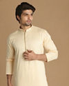 alt message - Manyavar Men Cream Printed Kurta Set image number 0