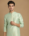 alt message - Manyavar Men Light Green Jacquard Kurta Set image number 0