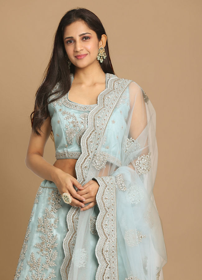 alt message - Mohey Women Graceful Light Blue Lehenga image number 1