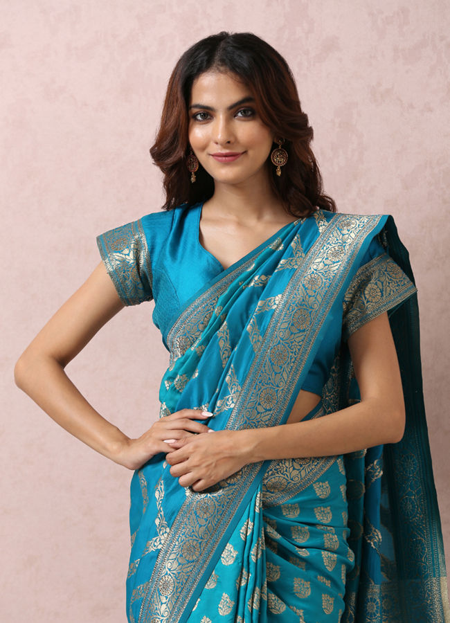 alt message - Mohey Women Teal Blue Golden Motif Saree image number 1