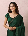 alt message - Mohey Women Bottle Green Satin Saree With Stone Embellishment image number 1