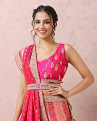 Mohey Women Stone Embellished Pink Benarasi Lehenga