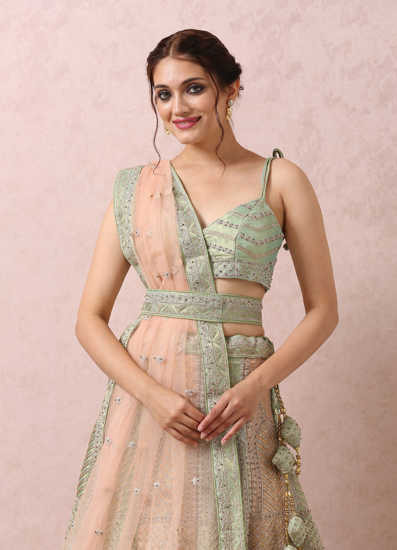Mohey Women Pista Embellished Bridal Lehenga