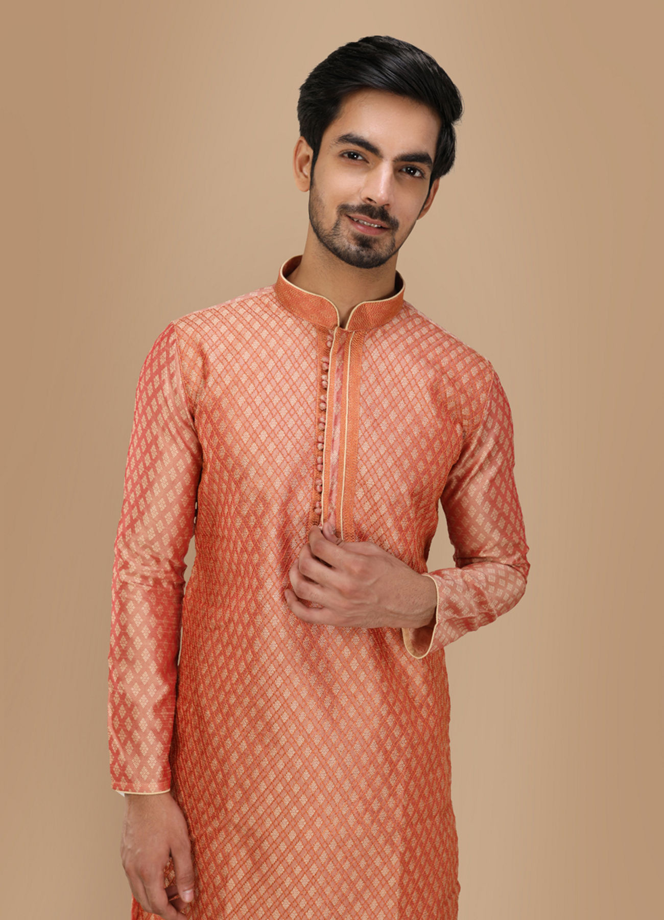 Manyavar Men Deep Coral Self Motif Kurta Set