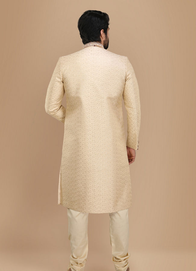 Manyavar Men Beige Sherwani Suit With Bold Zardozi Work