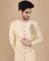 alt message - Manyavar Men Glam Biscuit Shade Sherwani Suit image number 0