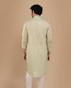 alt message - Manyavar Men Light Green Solid Kurta Set With Neck Detailing image number 1