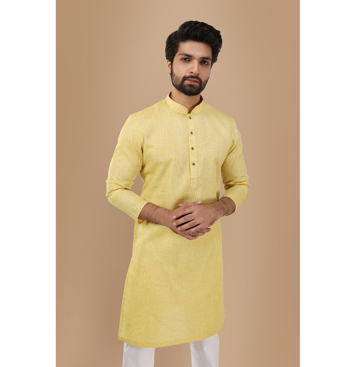 alt message - Manyavar Men Faded Yellow Solid Kurta image number 0