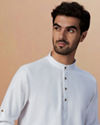 alt message - Manyavar Men White Plain Short Kurta image number 0