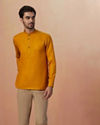 alt message - Manyavar Men Mustard Yellow Plain Short Kurta image number 1