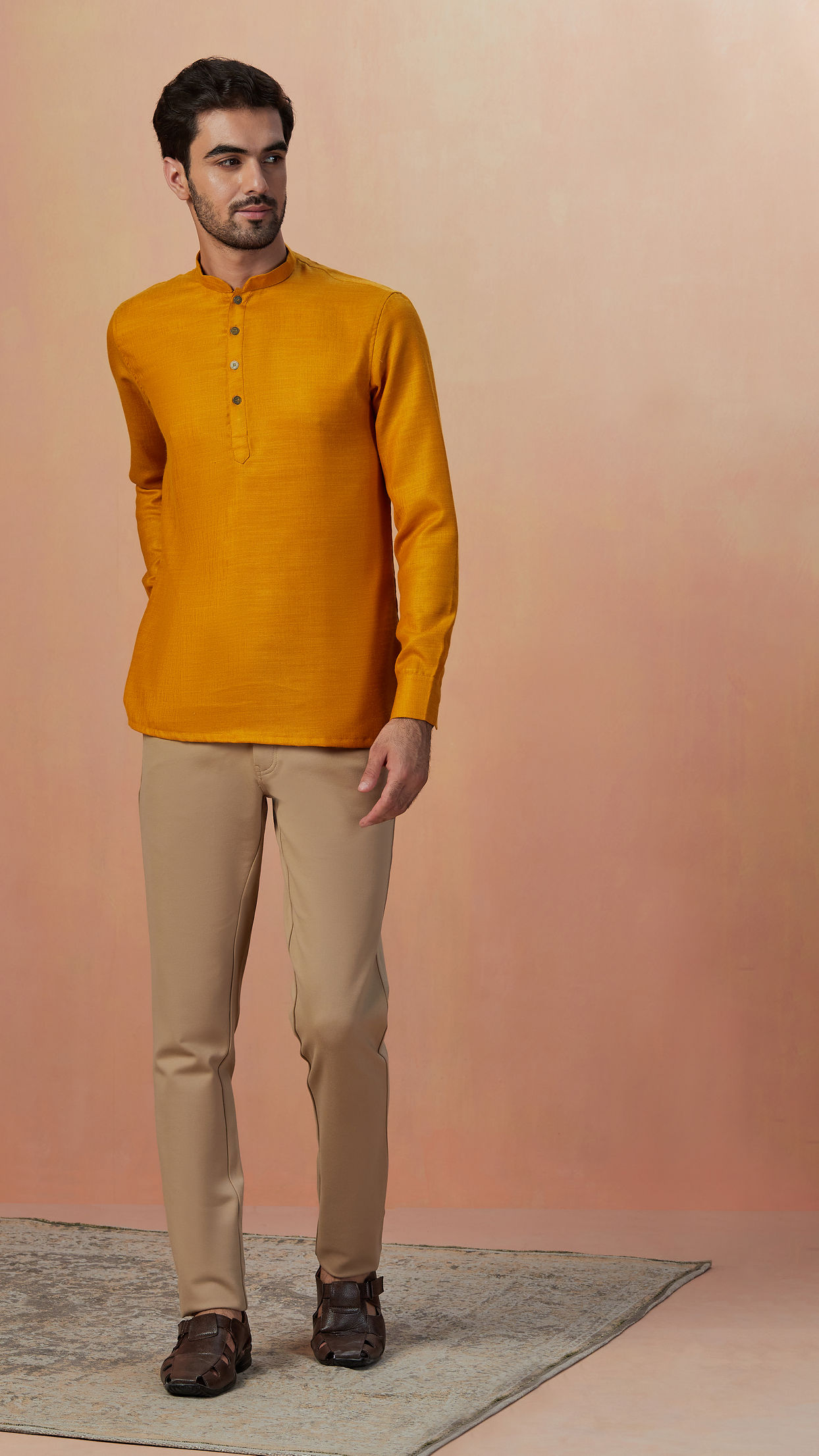 alt message - Manyavar Men Mustard Yellow Plain Short Kurta image number 1