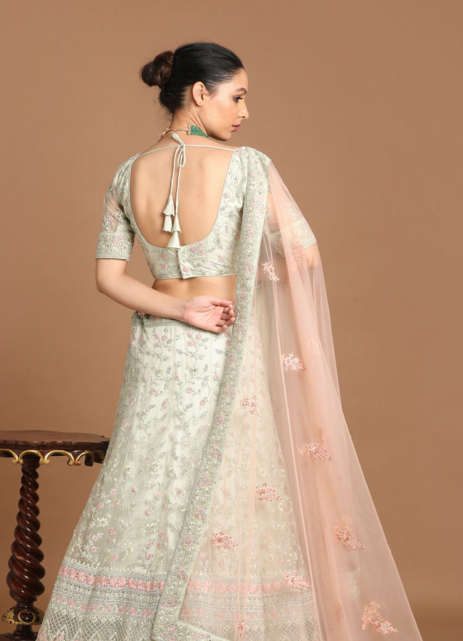 alt message - Mohey Women Playful Pista Lehenga image number 3