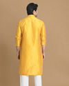 alt message - Manyavar Men Golden Yellow Solid Kurta Set image number 2