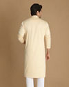 alt message - Manyavar Men Cream Printed Kurta Set image number 2