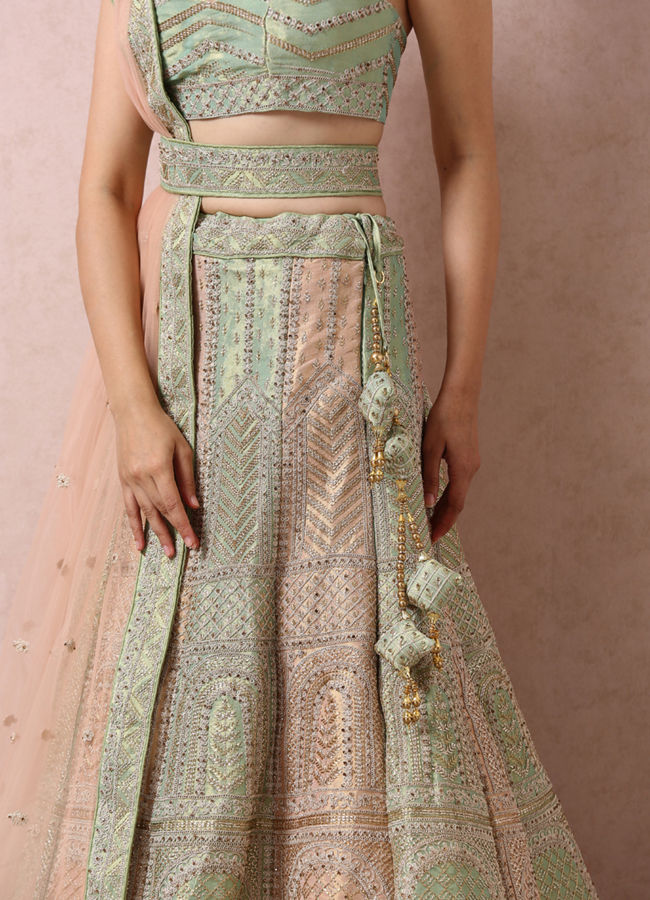 Mohey Women Pista Embellished Bridal Lehenga