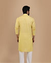 alt message - Manyavar Men Faded Yellow Solid Kurta image number 2