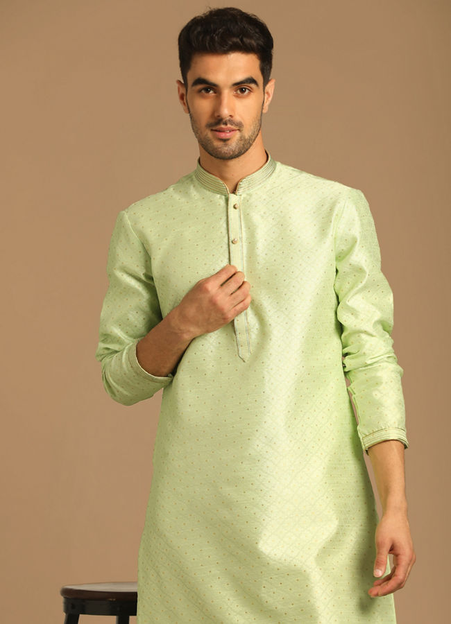 alt message - Manyavar Men Light Green Kurta Set With Golden Booti image number 0