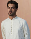 alt message - Manyavar Men White Self Printed Short Kurta image number 0