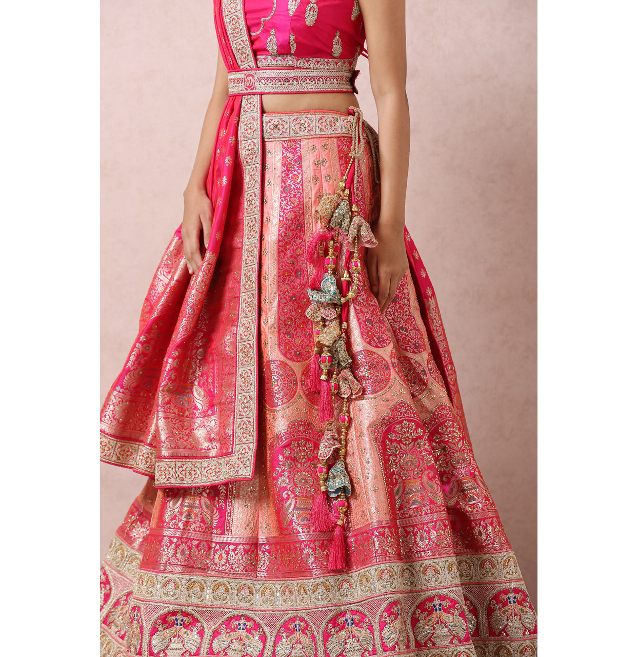 Mohey Women Stone Embellished Pink Benarasi Lehenga