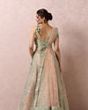 alt message - Mohey Women Pista Embellished Bridal Lehenga image number 3