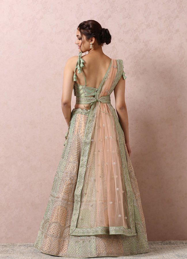 Mohey Women Pista Embellished Bridal Lehenga