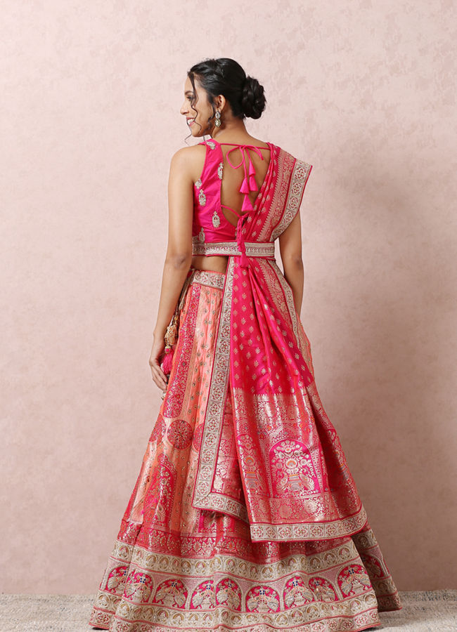 Mohey Women Stone Embellished Pink Benarasi Lehenga
