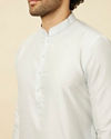 alt message - Manyavar Men Bright White Floral Patterned Angrakha Style Indo Western Set image number 2