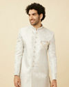 alt message - Manyavar Men Cloud Silver Bel Buti Patterned Indo Western Set image number 0