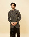 alt message - Manyavar Men Soot Black Jaal Patterned Drape Detailed Indo-Western Set image number 0