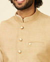 alt message - Manyavar Men Beige Fawn Self Patterned Nehru Jacket image number 1