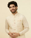 alt message - Manyavar Men Elegant Biscuit Shade Jacket image number 0